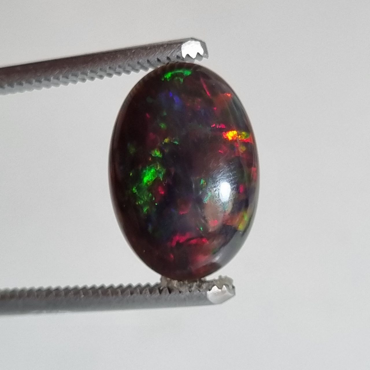 بلک اوپال معدنی با رفلکس زیبا شناسه 8195