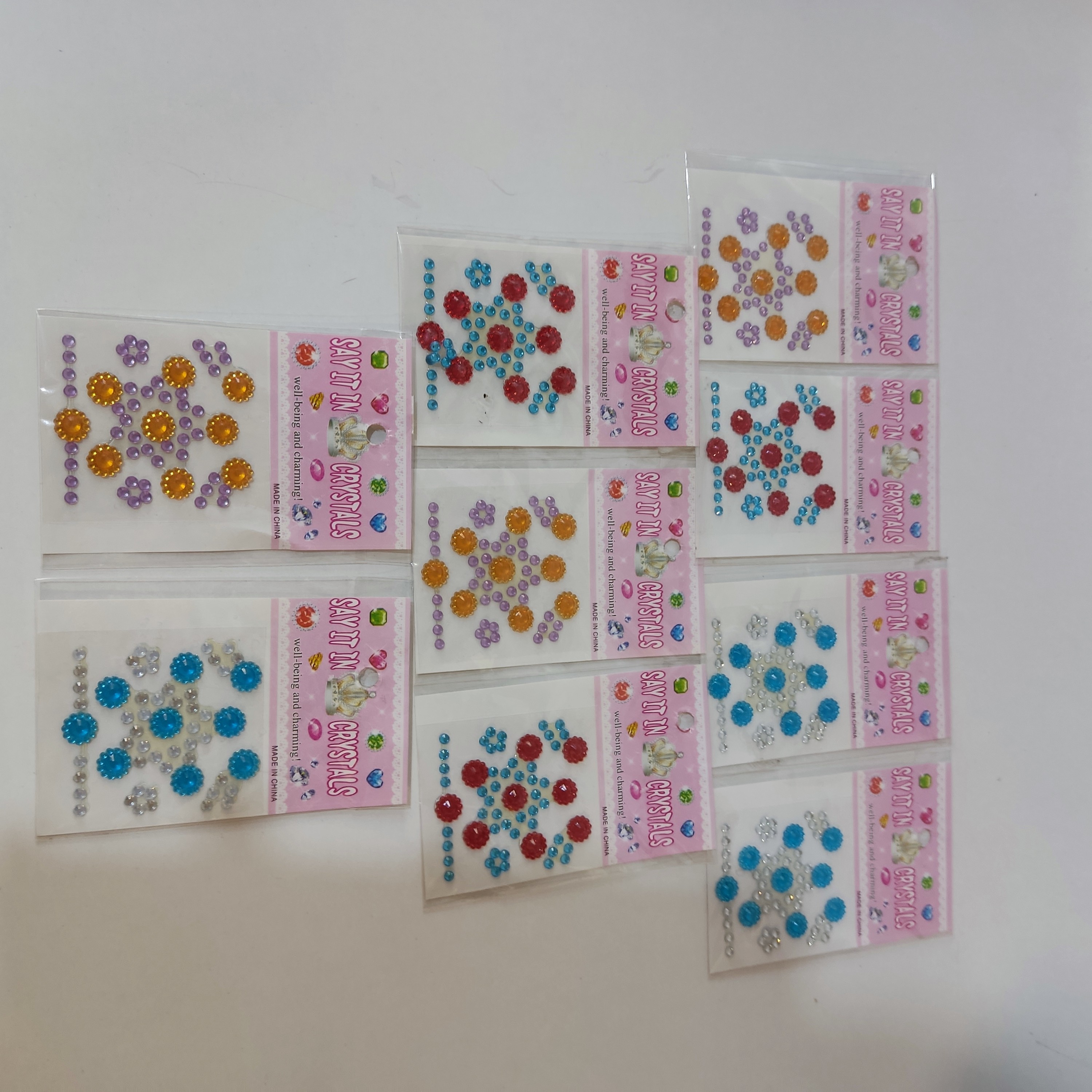 منجوق برچسبی درجه یک ورقی در طرح ها و رنگ های مختلف