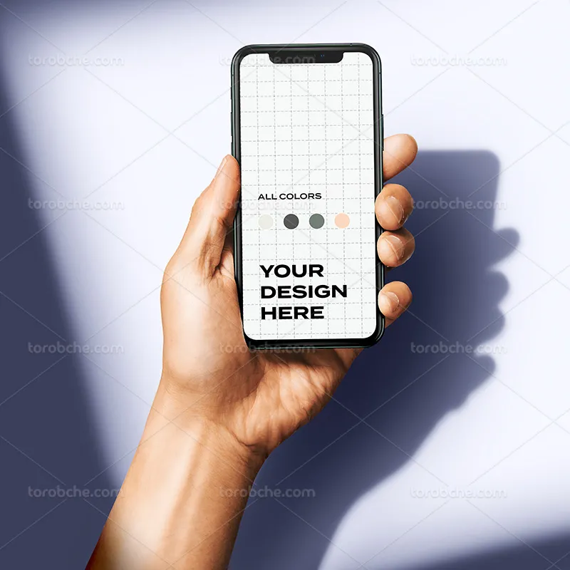 موکاپ PSD موبایل در دست | گرافیک با طعم تربچه
