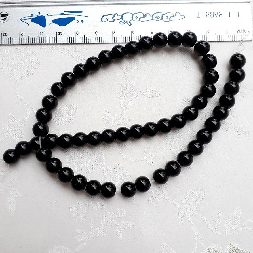 سنگ اونیکس مشکی براق سایز 8(یک بند)