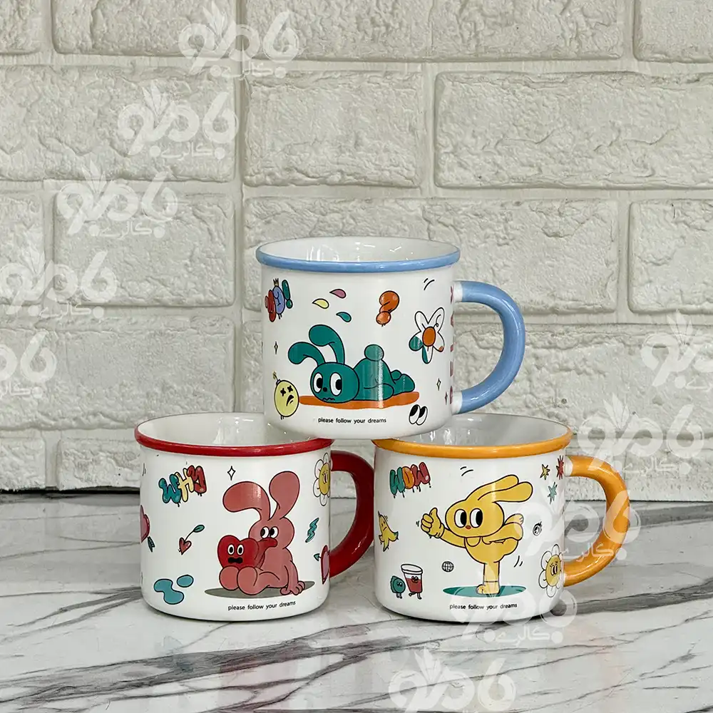 ماگ سرامیکی طرح عروسکی دسته رنگی