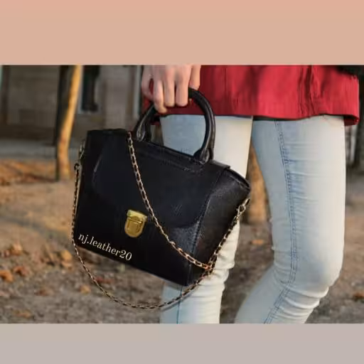 کیف چرم زنانه . کاملا دستدوز با چرم گاوی طبیعی 