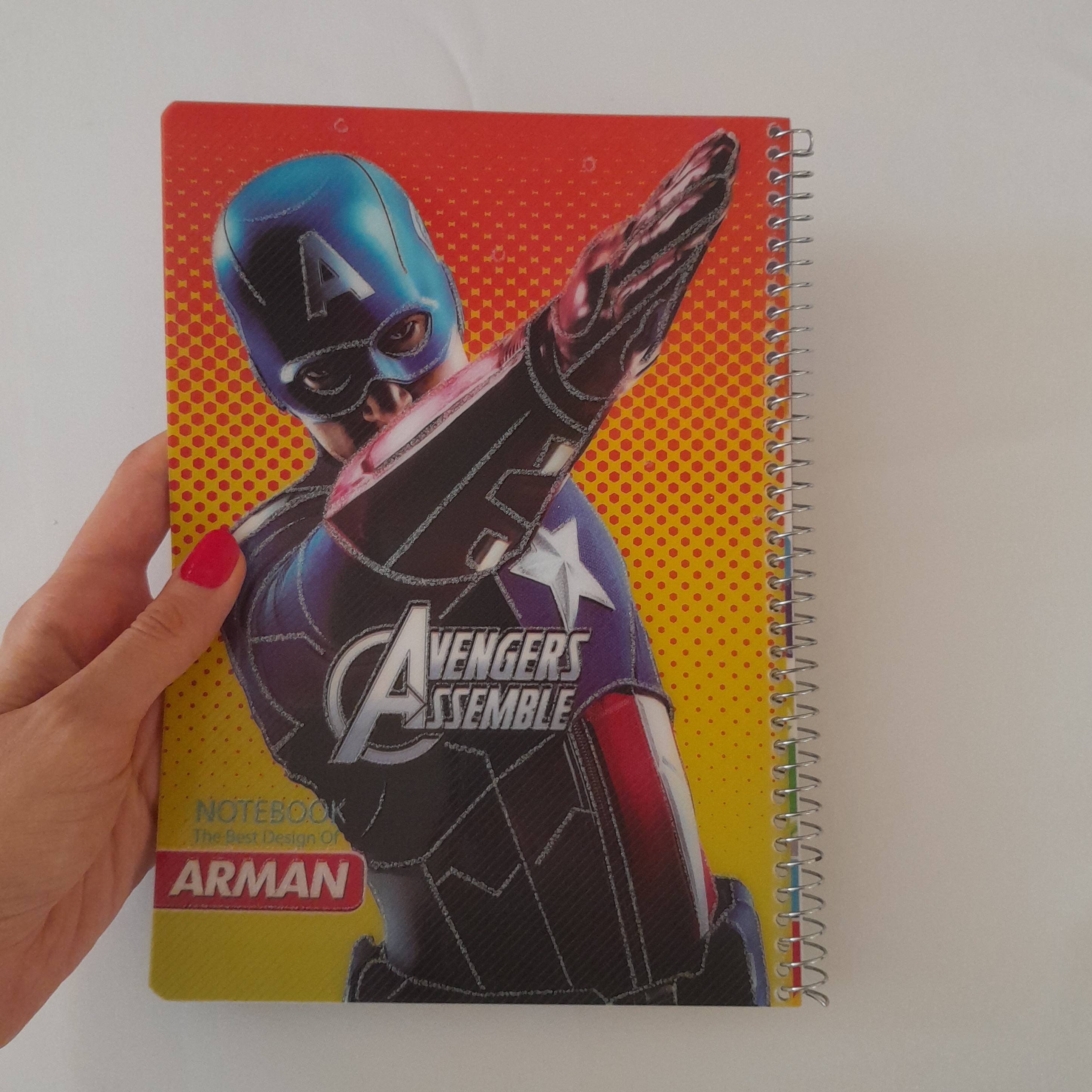 دفتر سیمی50برگ آرمان دارای روکش سلفی براق روی جلدکارتونی درطرح های متنوع(کد6)