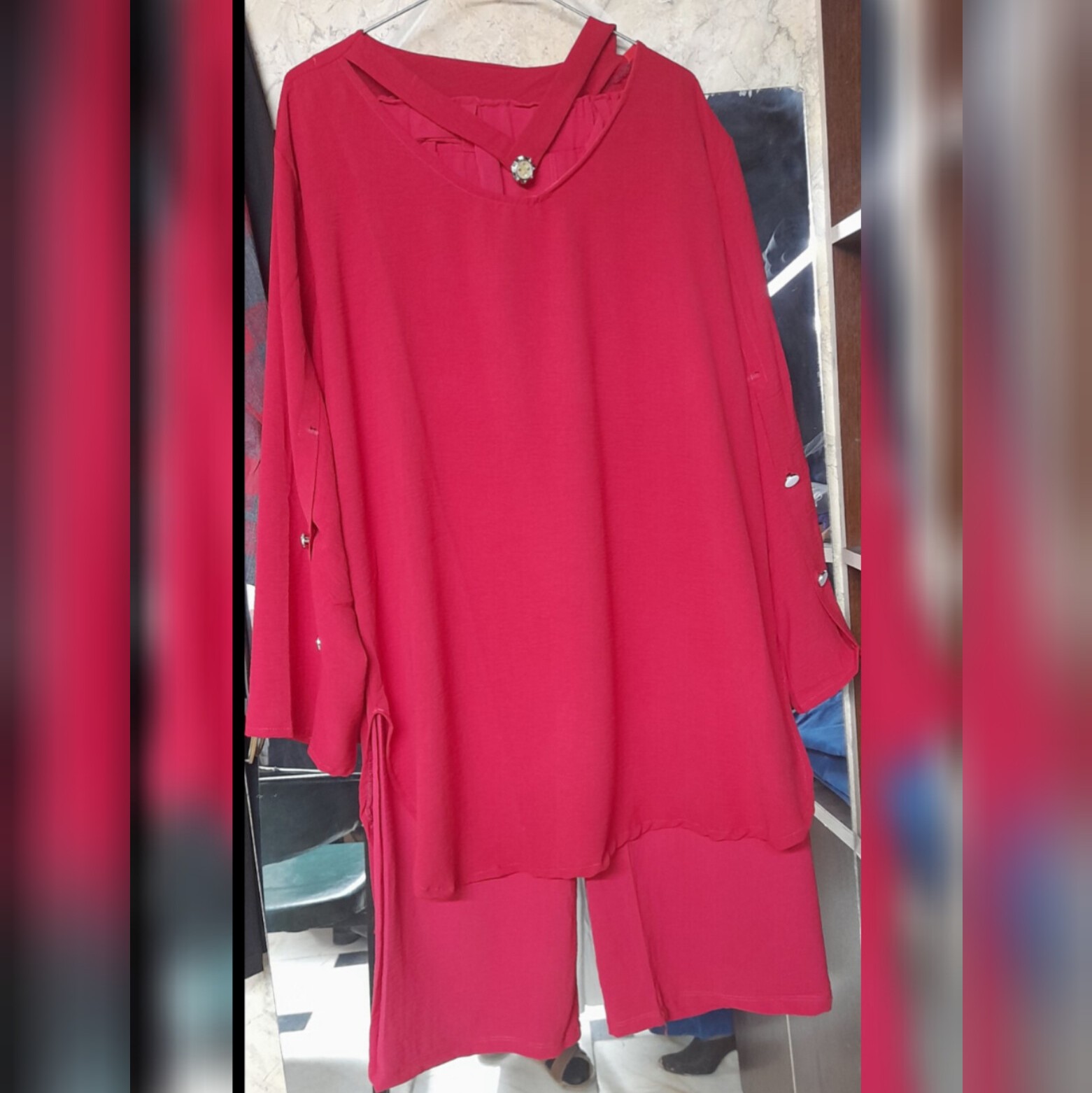 ست زنانه تونیک شلوار ابرو بادی استین دکمه و گردنبنددار باپارچه ی گرم بالا
