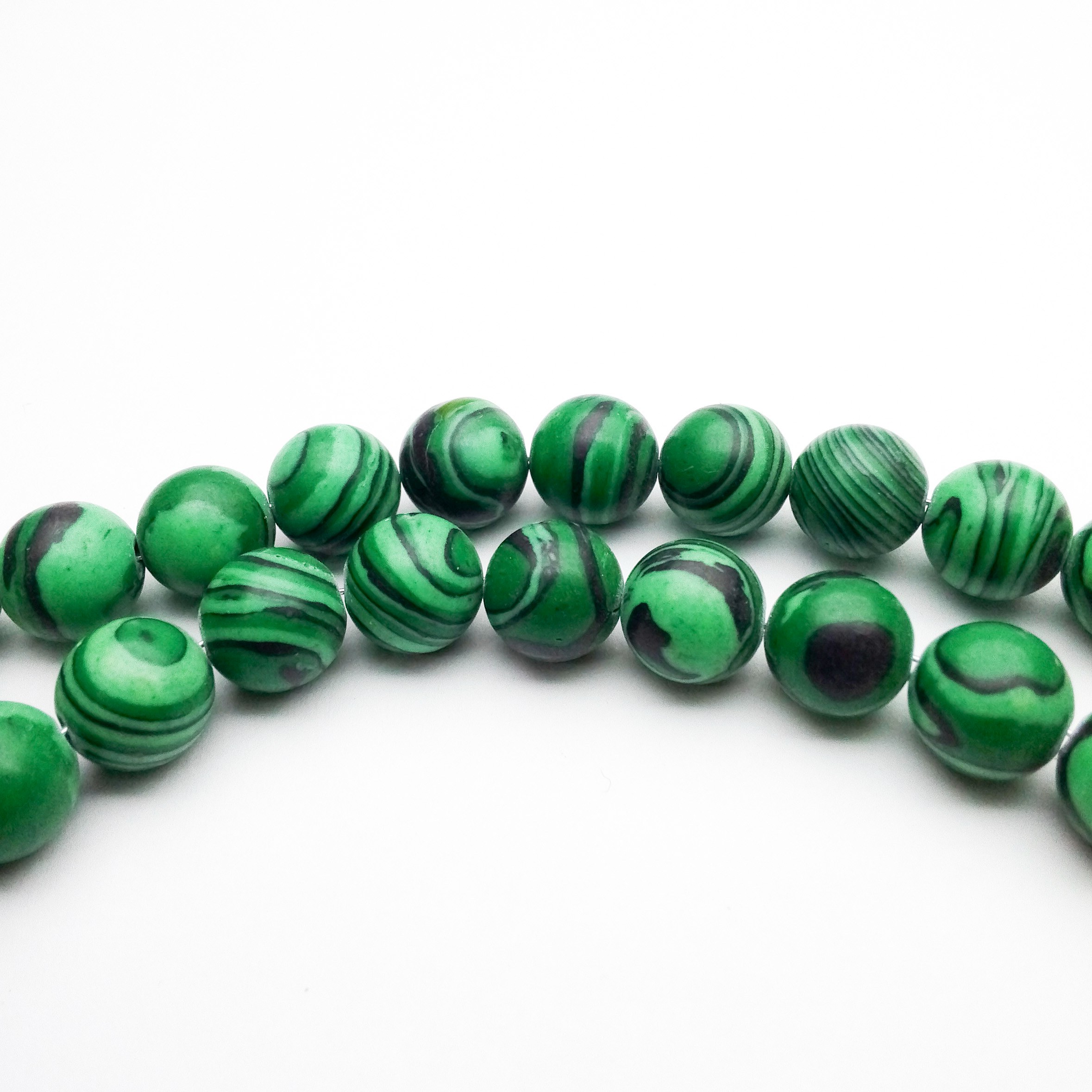 سنگ مالاکیت سایز 10 (حدود 20 مهره)