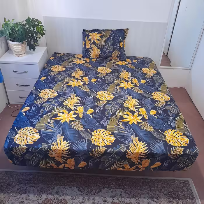 سرویس ملحفه مدل ni08064 طرح برگ انجیری کد 100 یک نفره دو تکه