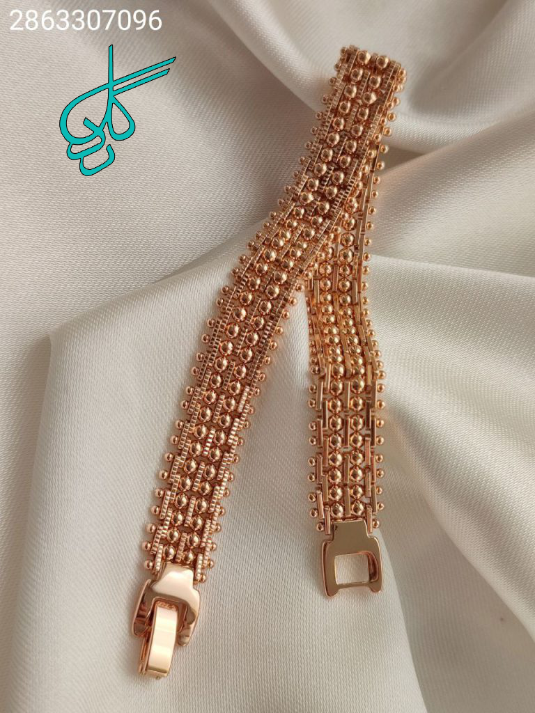 خرید دستبند پهن توپی رنگ ثابت برند ژوپینگ کد 1215017 - ردگل