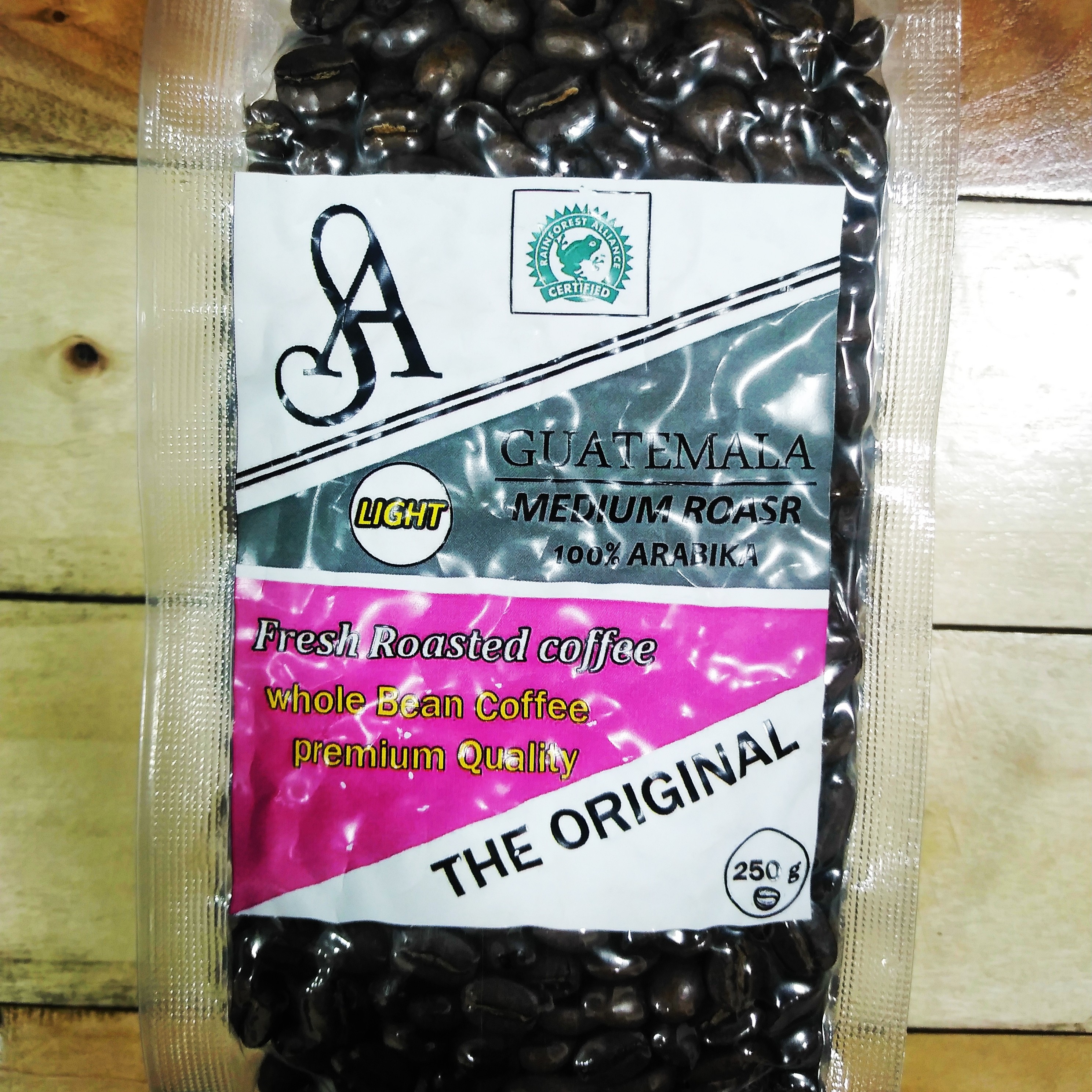 قهوه دان 100عربیکاGuatemala رست لایت بسته بندی وکیوم شده 250 گرمی. 