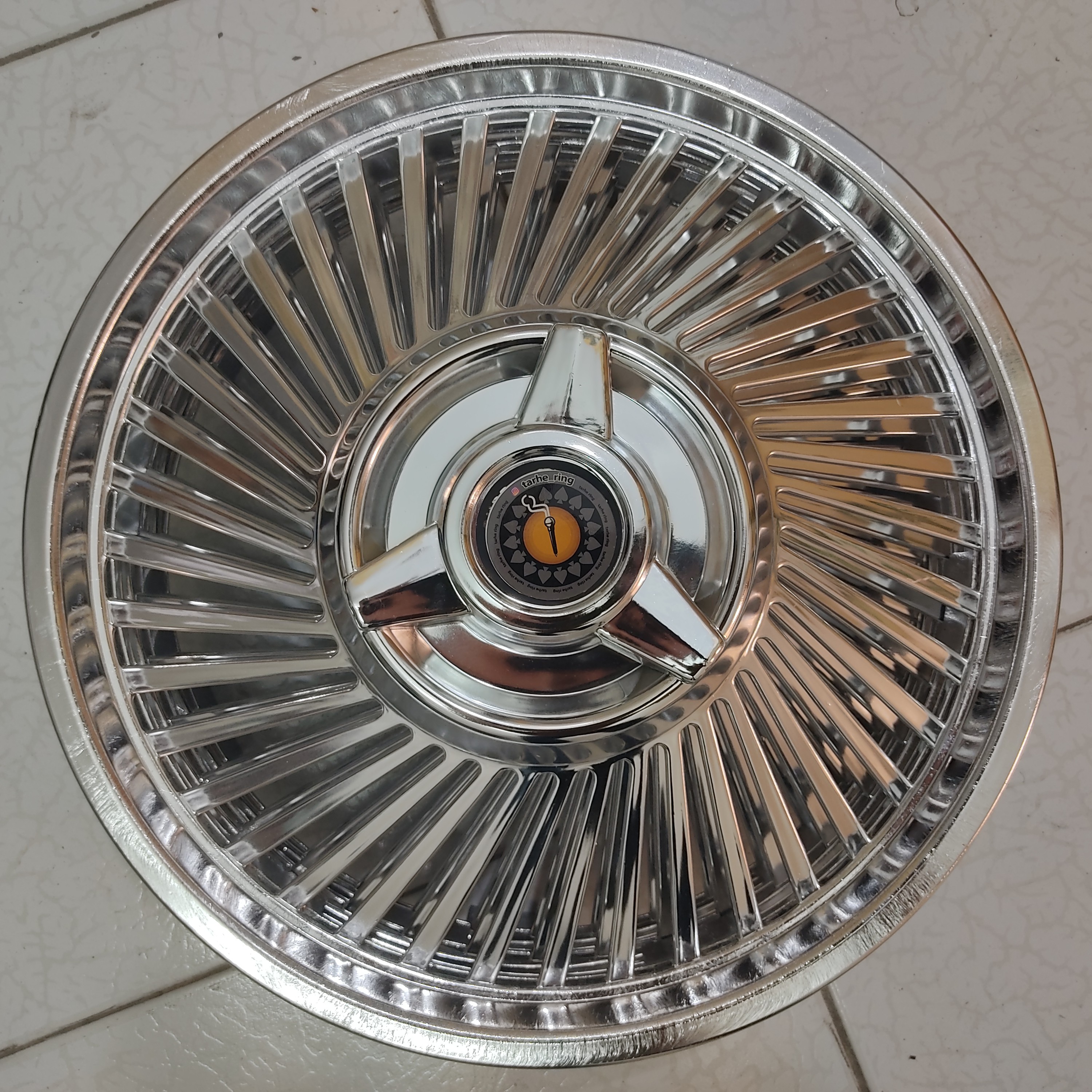 قالپاق فلزی پرشیا جنس پلاستیک آبکاری استیل طرح فلزی مدل پره ایپژو پارس سایز  دور رینگ 14 اینچ 