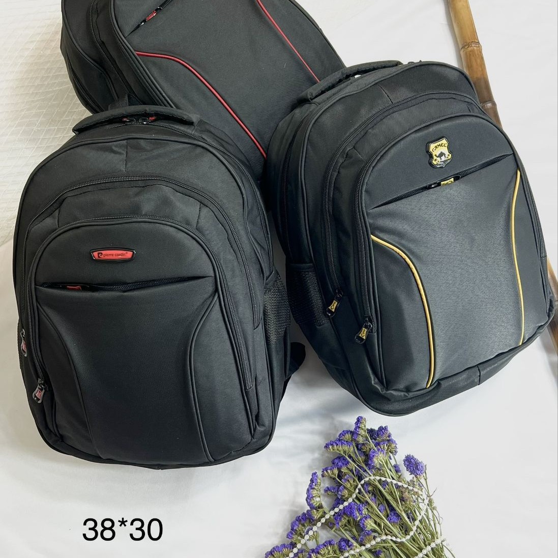 کیف کوله پشتی رنگ مشکی با نوار دوزی رنگی ابعاد 30 در 38