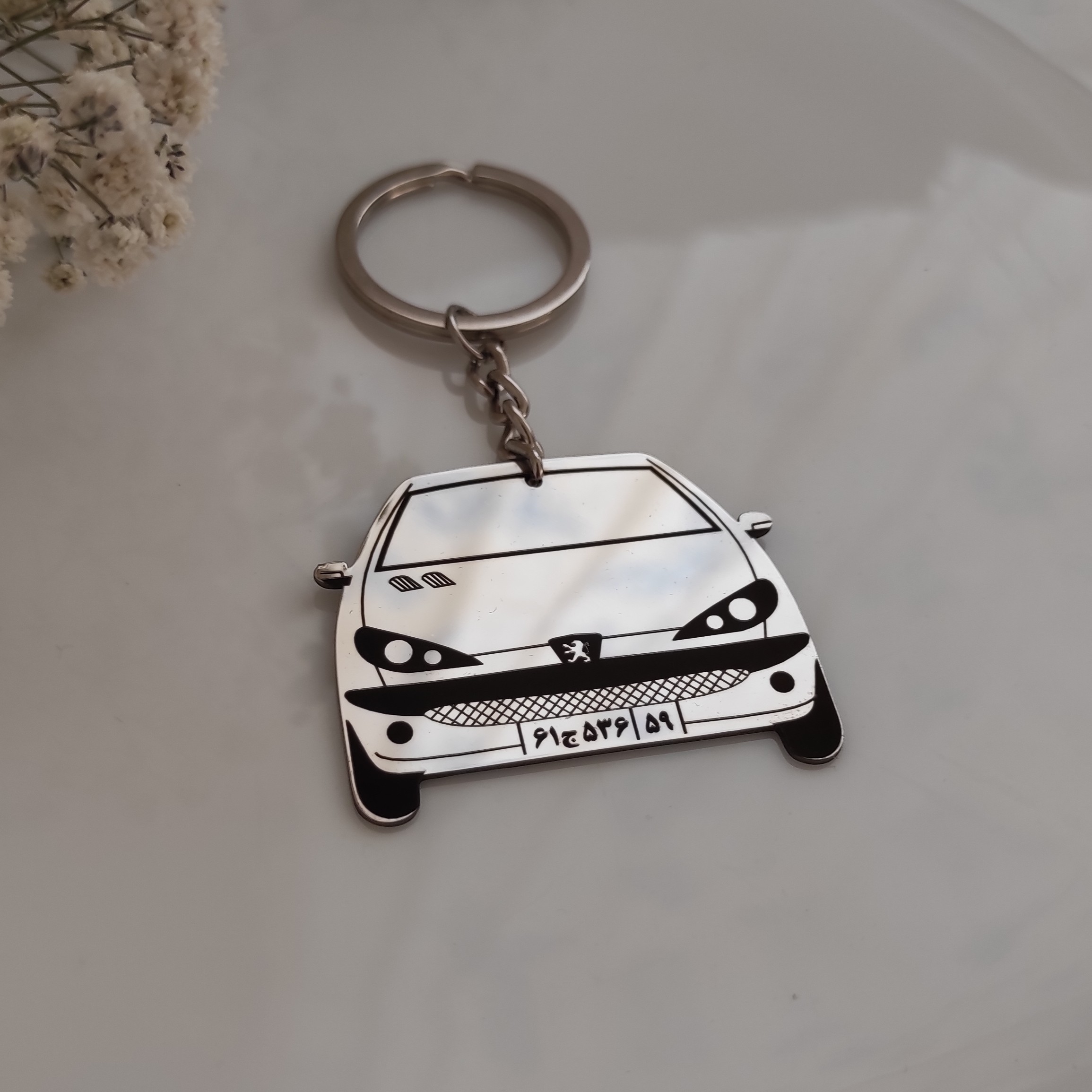 جاکلیدی ماشین پژو 206 استیل رنگ ثابت نقره  ای(ارسال رایگان)