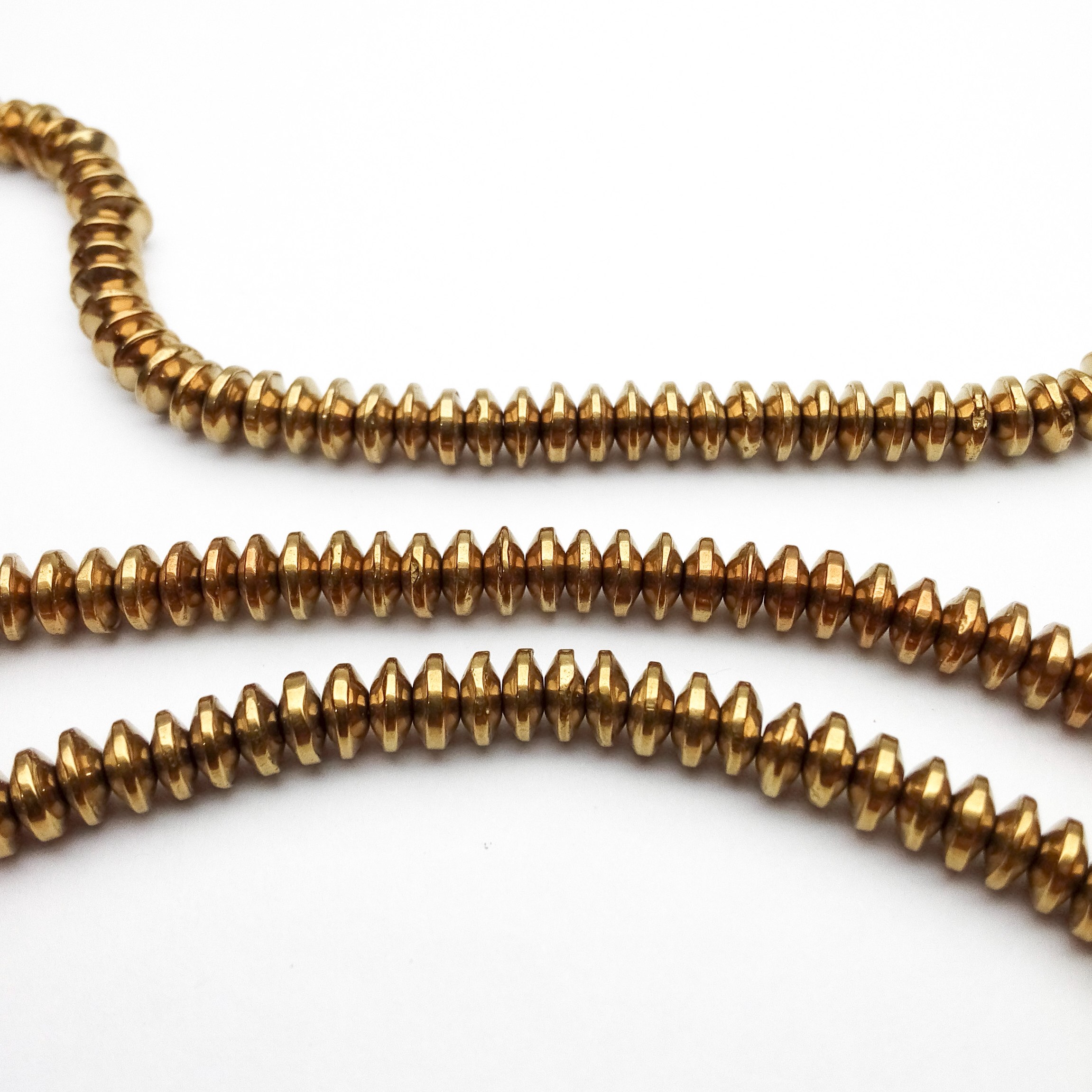 سنگ حدید واشری طلایی  (حدود 95 مهره)