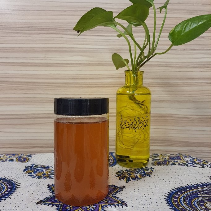 عسل اقاقیا 900 گرمی کاملا خالص و طبیعی با برگه آزمایش