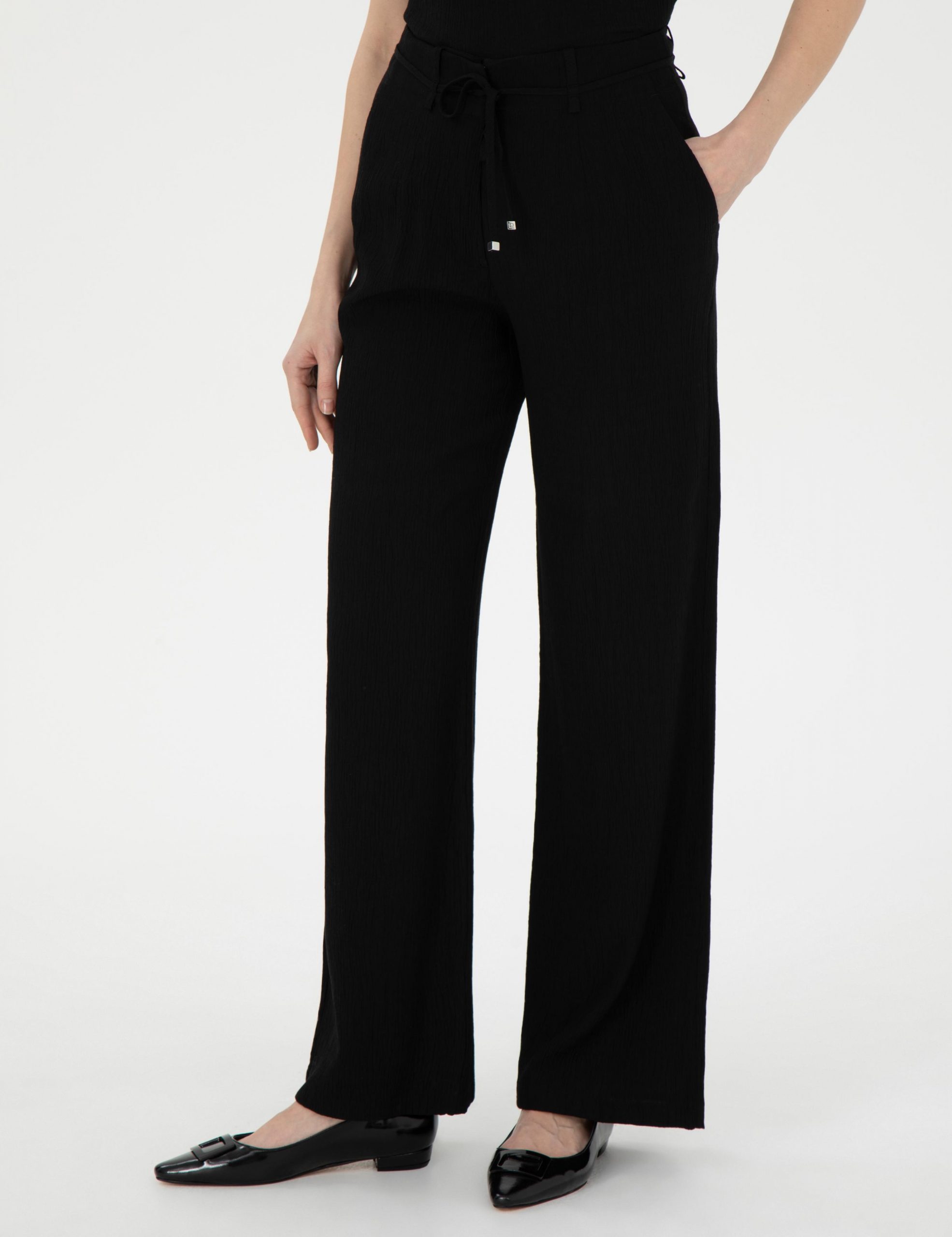 شلوار پارچه ای زنانه مشکی پیرکاردین - فروشگاه لباس شهرمون