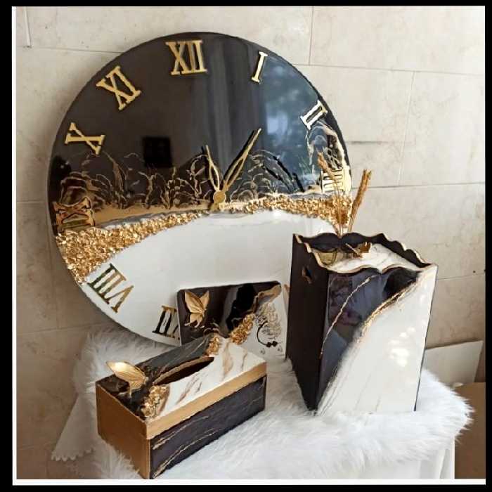 ساعت دیواریسفید مشکی (پس کرایه)