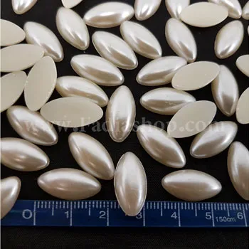 نگین تزئینی چشمی کرم سایز 2