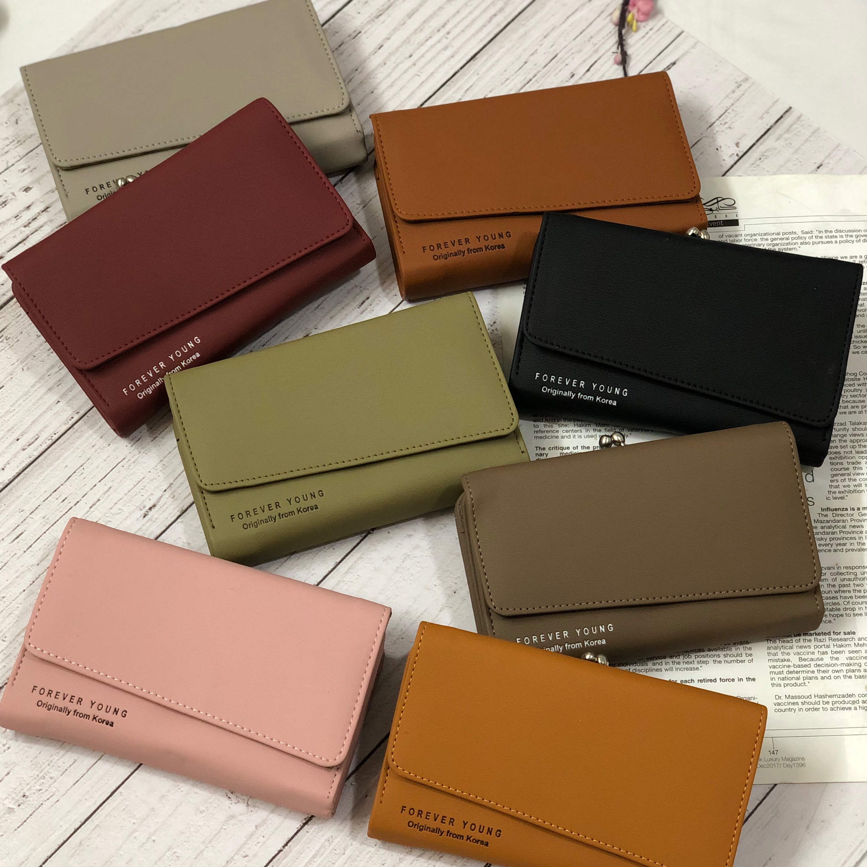 کیفپول دهنه دار لب کج جدید با رنگبندی جذاب