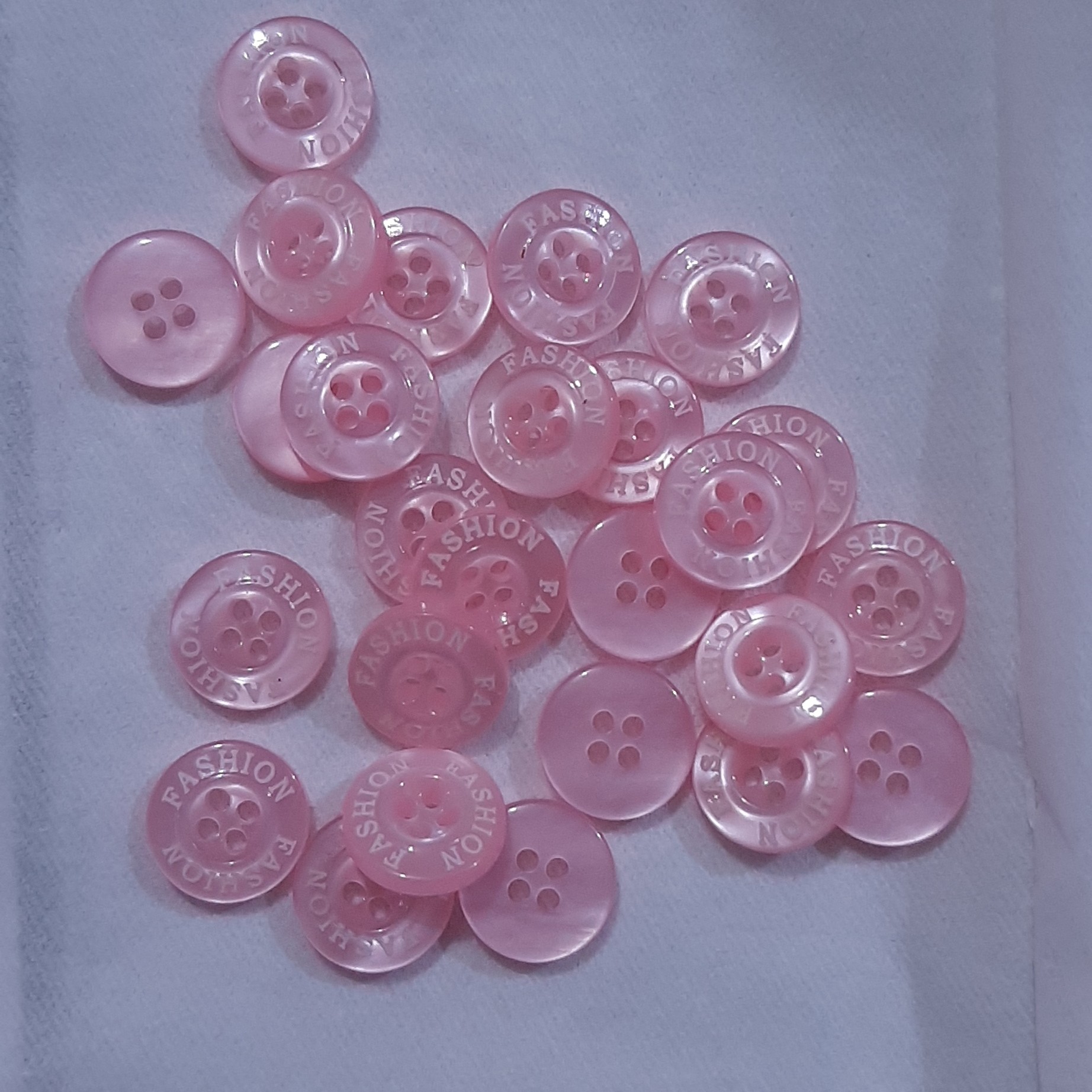 دکمه پیراهن مردانه رنگ صورتی 