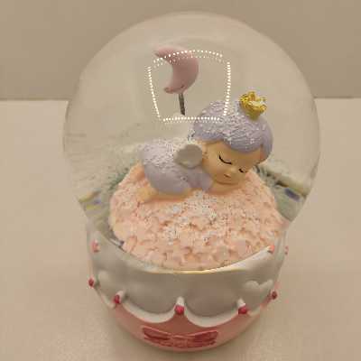 گوی موزیکال مدل پمپی پسرک فرشته و ماه