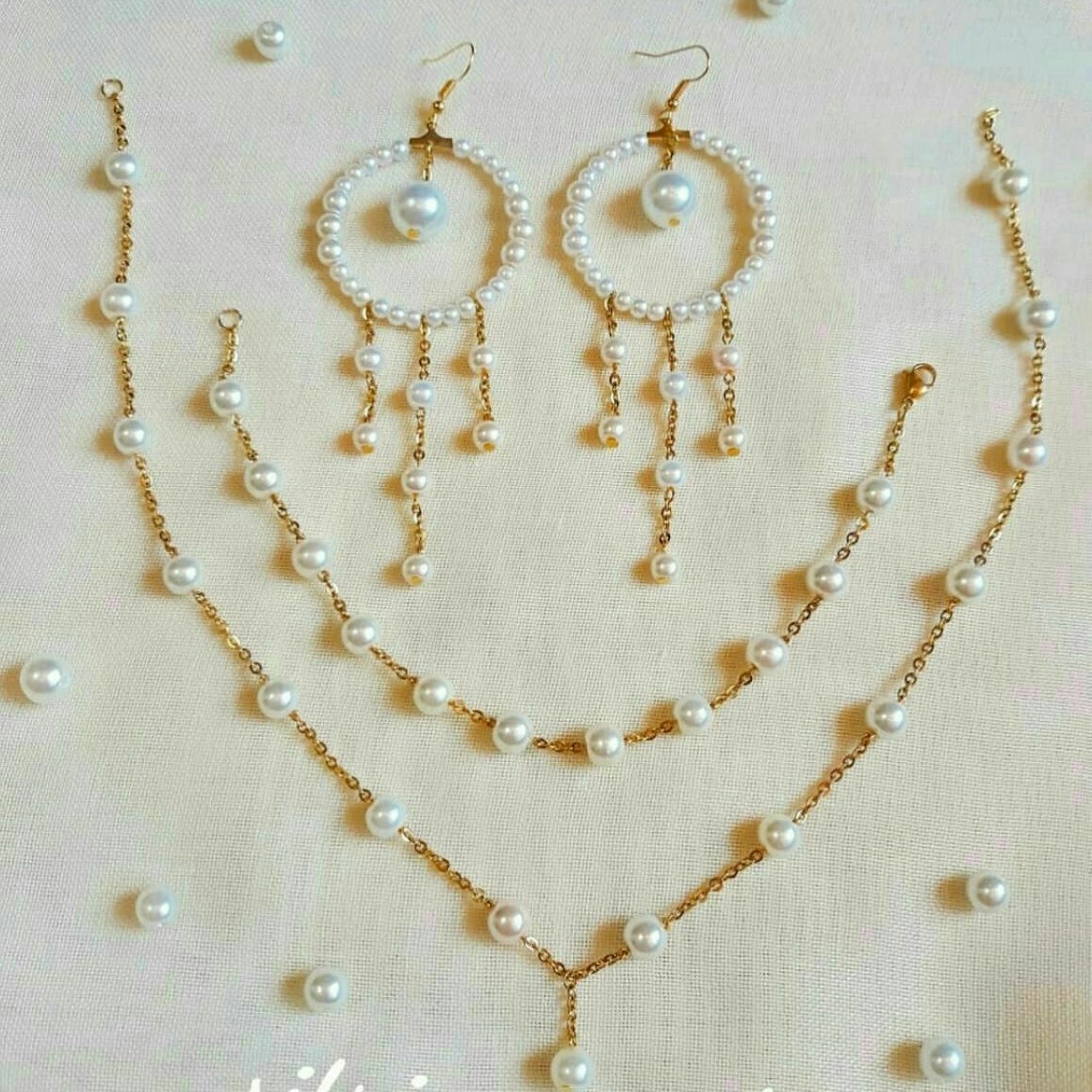 ست گردنبند و دستبند و گوشواره مرواریدی رنگ ثابت ارسال رایگان