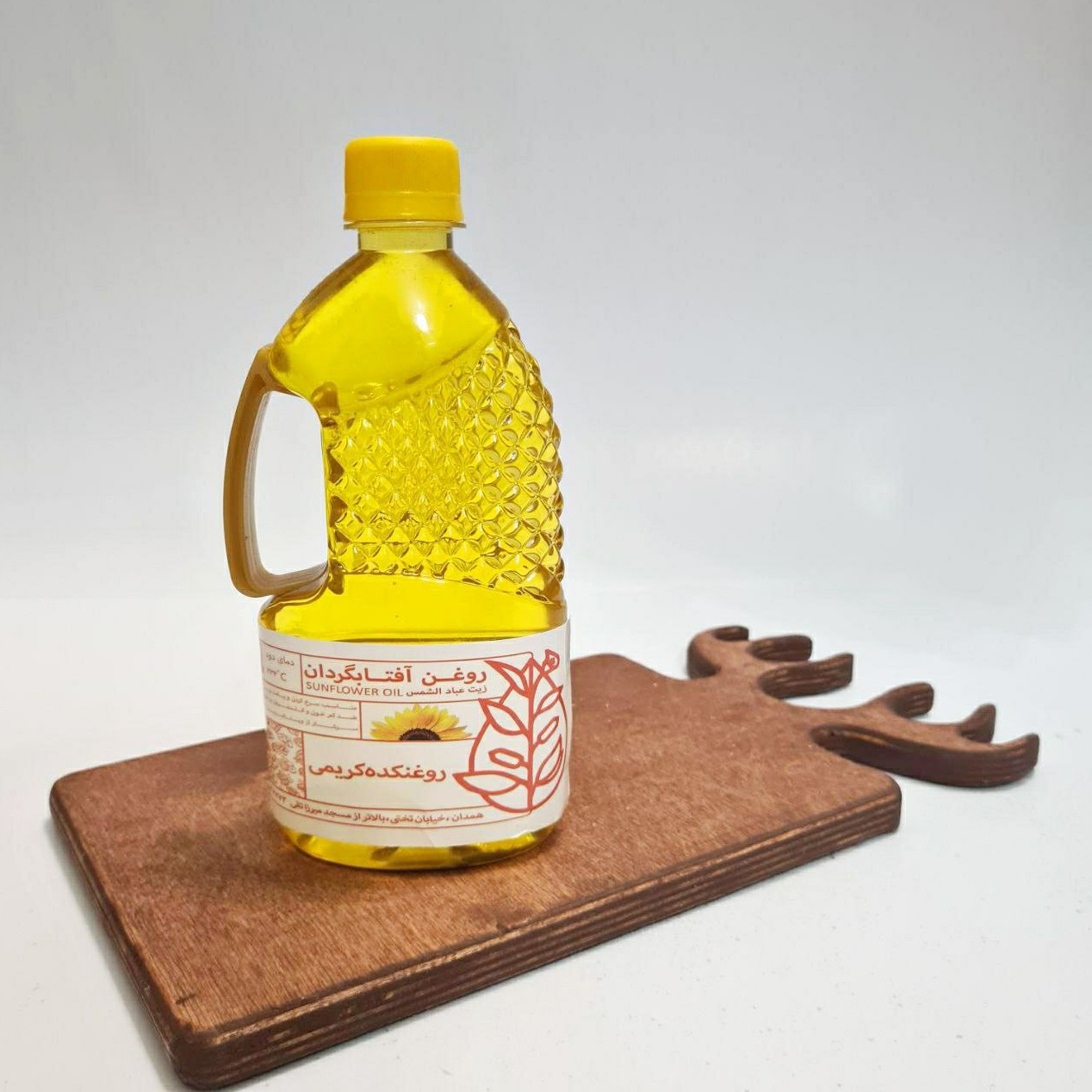 روغن آفتابگردان نیم لیتری خالص و طبیعی اعلا روغنکده کریمی
