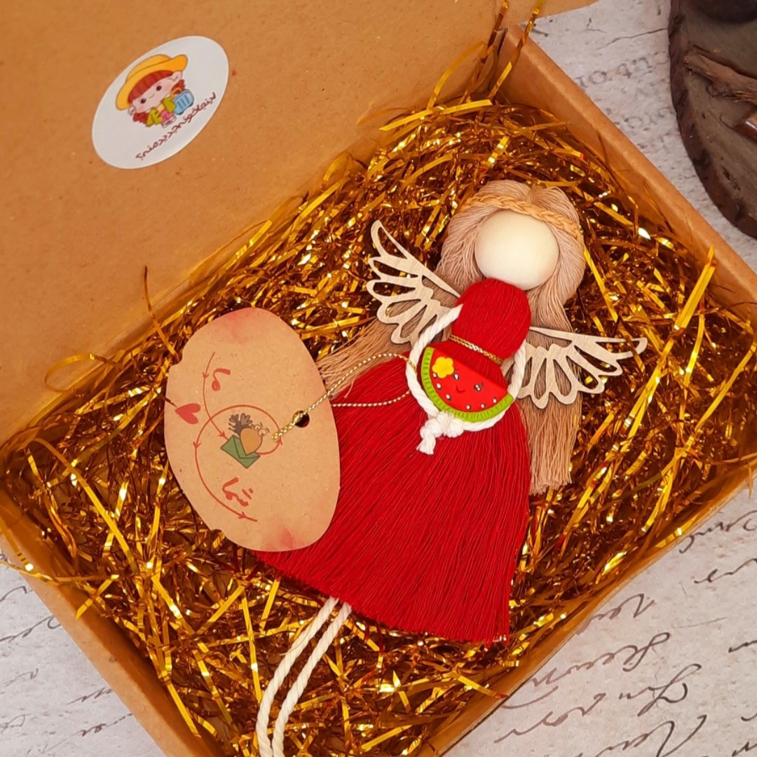 عروسک همراه بسته بندی