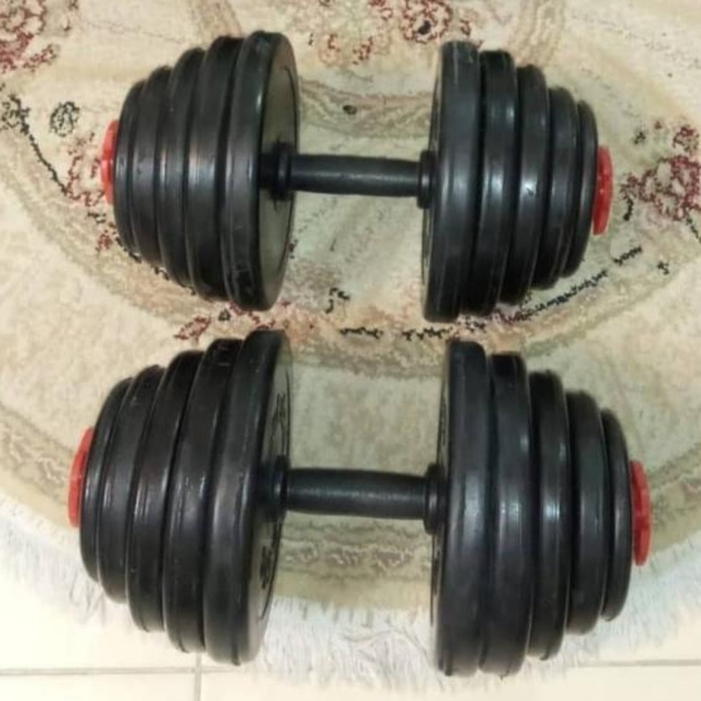 بسته 30 کیلویی solid steel یک جفت دمبل متغیر 15 کیلوگرم . لاستیک توپر و فشرده مثل تایر لیفتراک