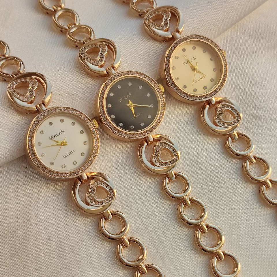 ساعت مچی زنانه برند والار طلایی طرح بندی متنوع دخترانه نگین دار فلزی مجلسی، روزمره
