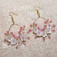 گوشواره حلقه ای گل صورتی مدل ماه فام و گالری شایسته