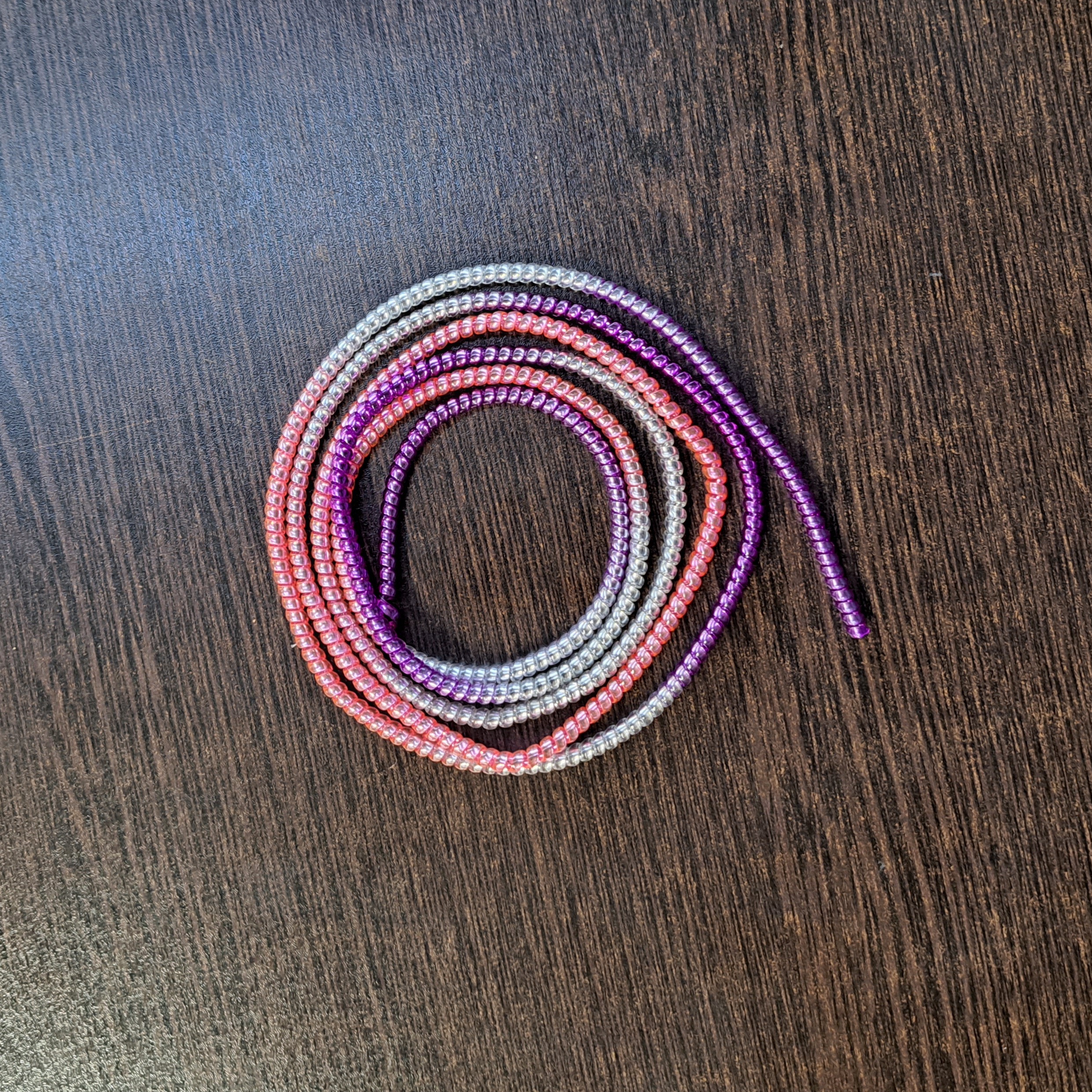 محافظ کابل لیزری 1.5 متری مناسب برای انواع سیم شارژر و هندزفری 