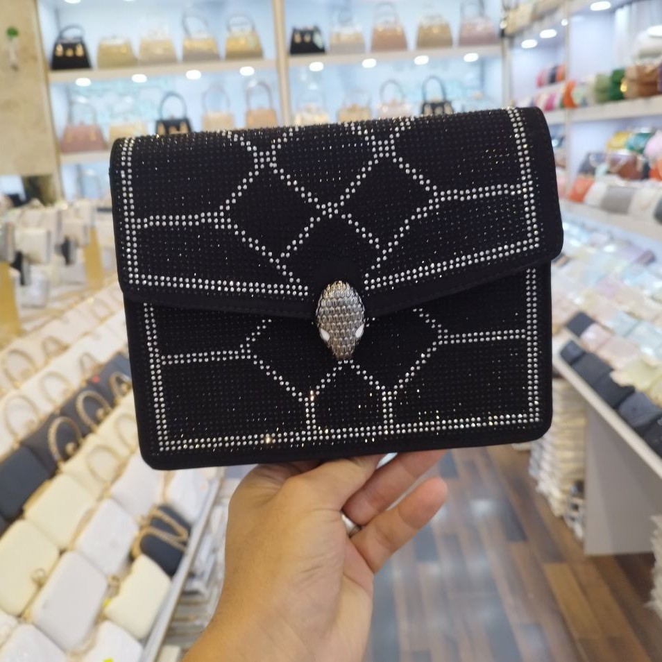 کیف زنانه مجلسی نگین دار تک رنگ مشکی