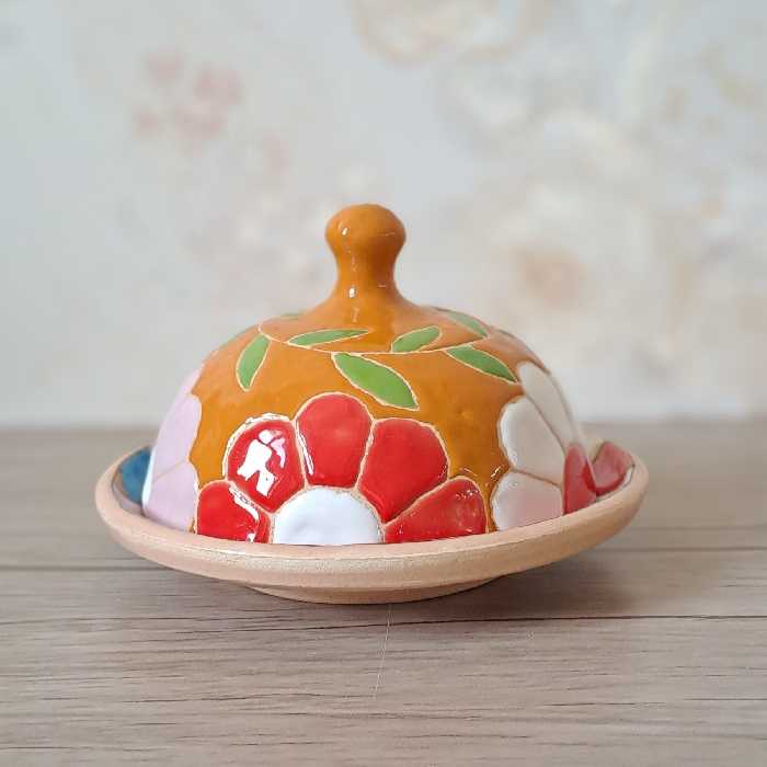 کره خوری میناکاری سفال پخت شده در کوره با رنگ ثابت و کاملا مصرفی رنگ زمینه پرتقالی