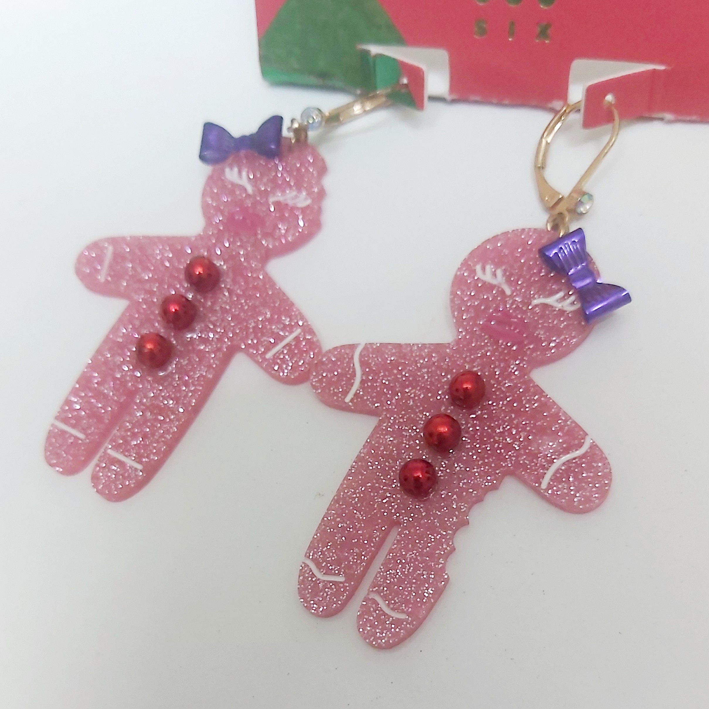 گوشواره دخترانه و زنانه اکلیلی طرح آدمک طول شش سانت بسیار زیبا و شیک در گوش وارداتی بارکد اسکن دار 