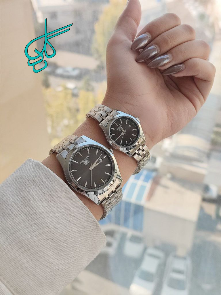 خرید ست ساعت مردانه و زنانه سیکو تقویم دار رنگ ثابت دارای قفل ضامن دار کیفیت عالی کد 2116292 - ردگل