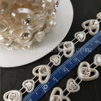 نوار توپی کرم نگین دار