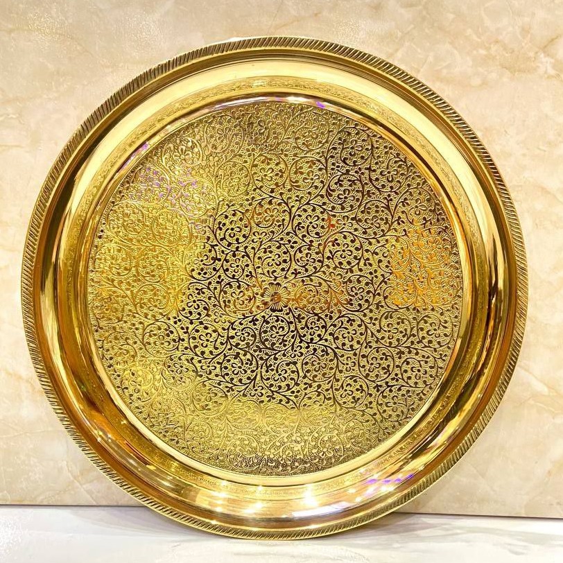 سینی برنجی هندی مدل گرد با طرح گل و قطر35 سانت با کیفیت بالا و بسیار ضخیم مناسب استفاده دائم و قابل شستشو بدون تغییر رنگ