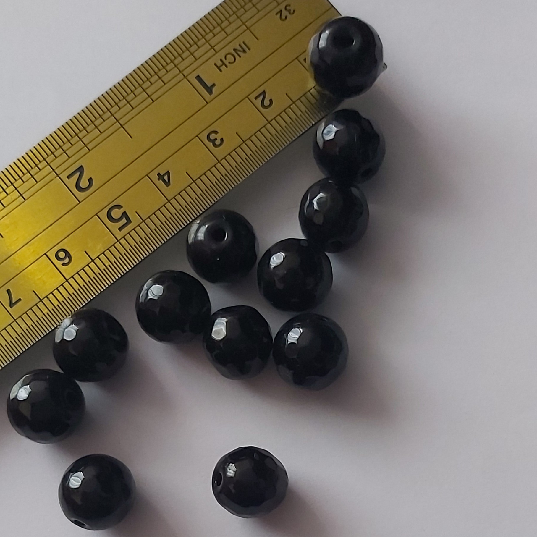 مهره سنگ اونیکس اصل مشکی تراشدار سایز12میلی متریک دونه