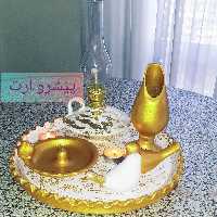 ست رومیزی سفالی سفید وطلایی شامل سینی 32سانتی وچراغ گردسوز وجاعودی وقلمدون ودوعدد مرغ آمین