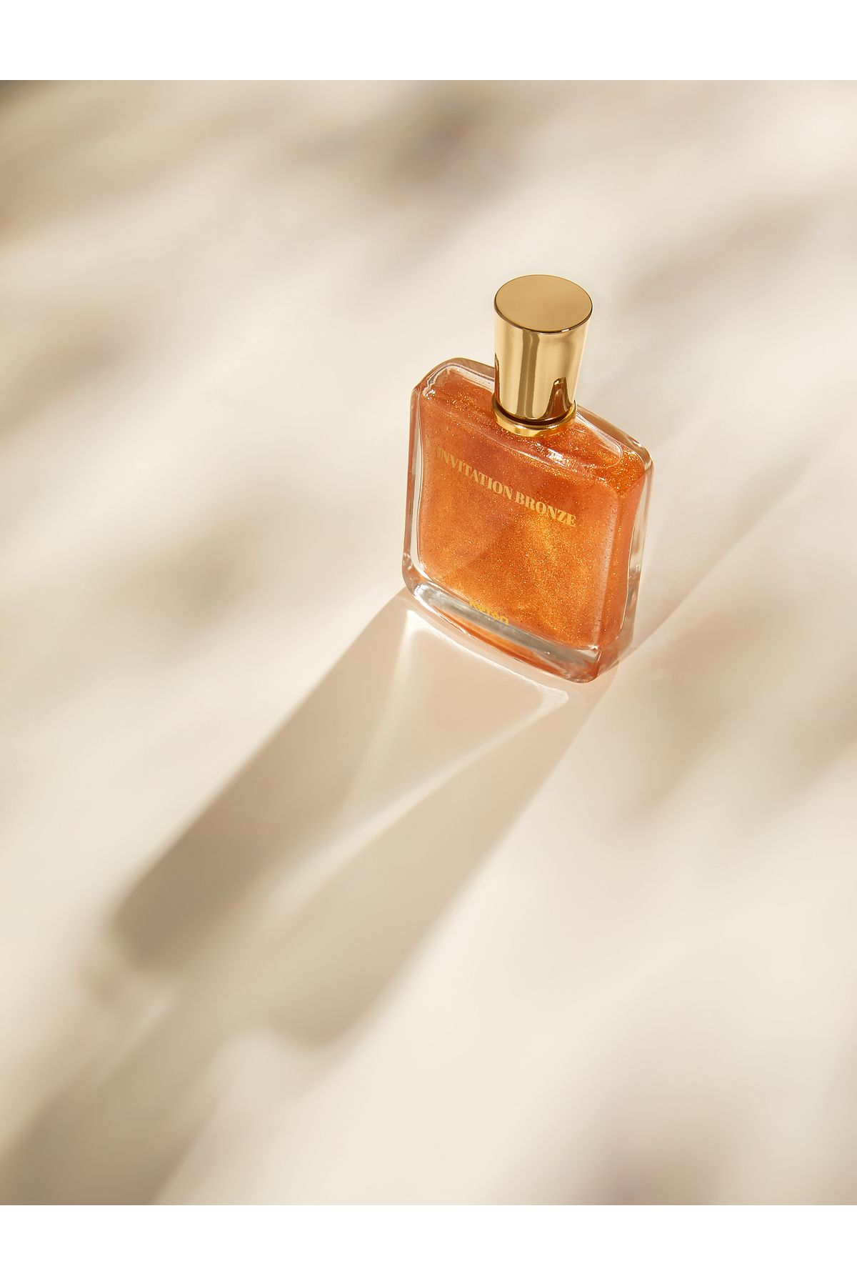 عطر زنانه دعوت برنز براق 50 میل Koton