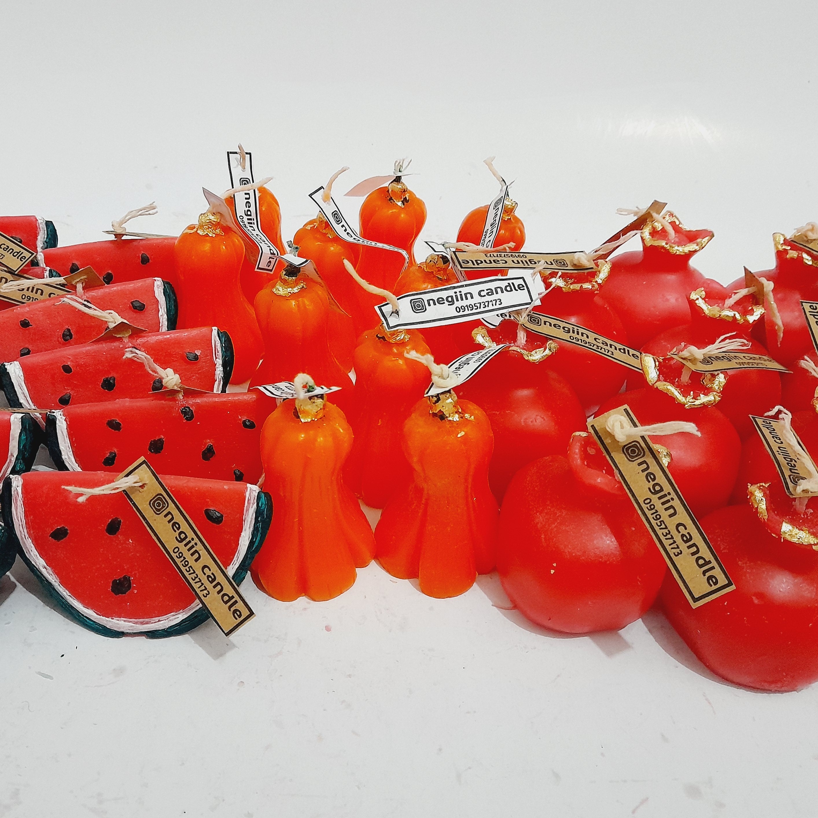 شمع کدو تنبل  در رنگ دلخواه،تزیین شده با ورق طلا،به صورت عمده وتک ارسال به سراسر ایران 