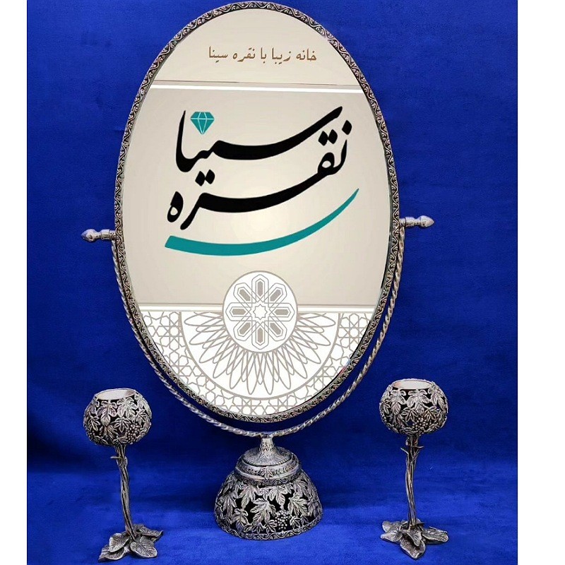 آینه شمعدان سیاه قلم مدل گهواره ای کد 45 وزن آینه 794 وزن شمعدان 5688 ارتفاع آینه 58 عرض 39 ارتفاع شمعدان 19 عیار900