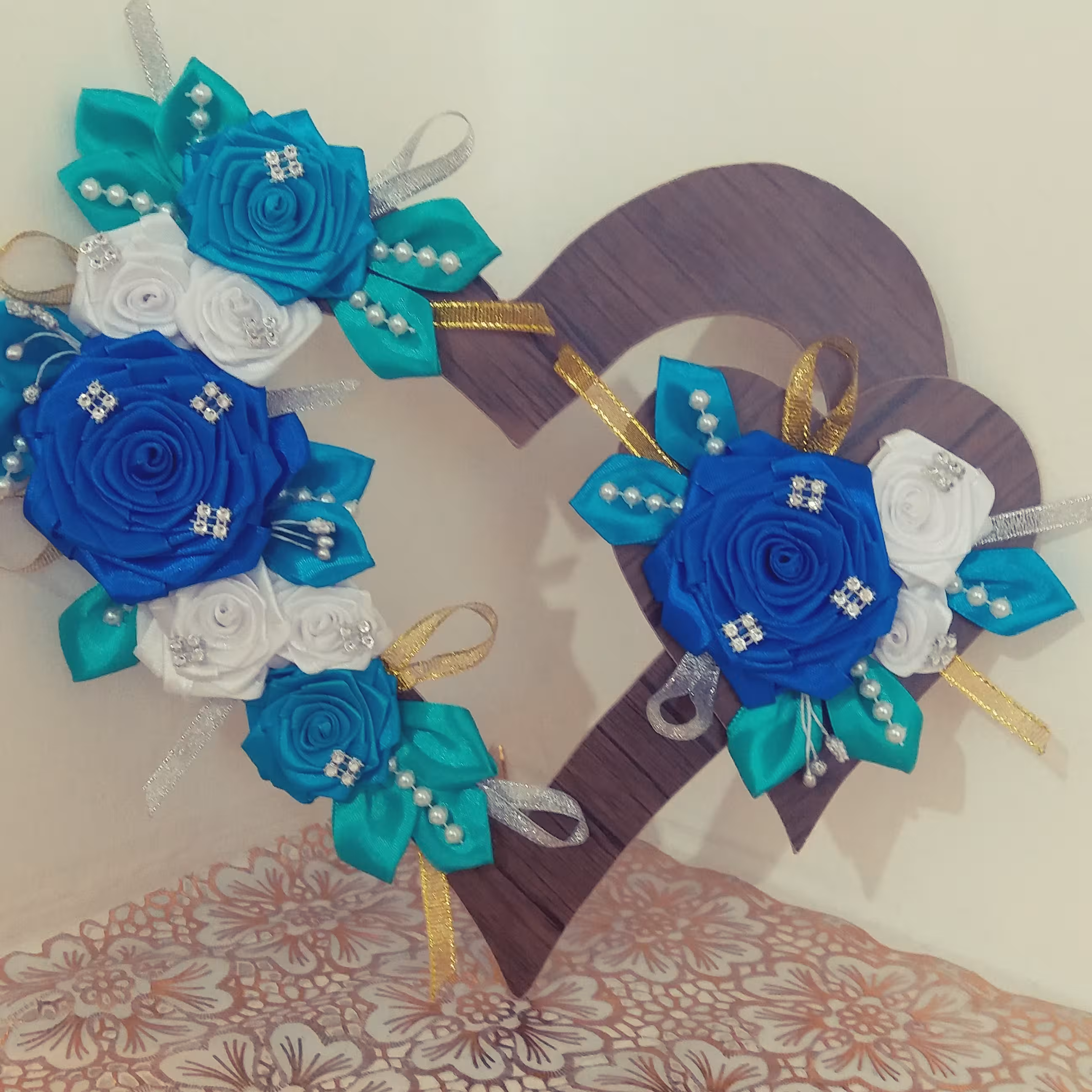 دیوار کوب (یا حلقه گل رو دری قلبی)