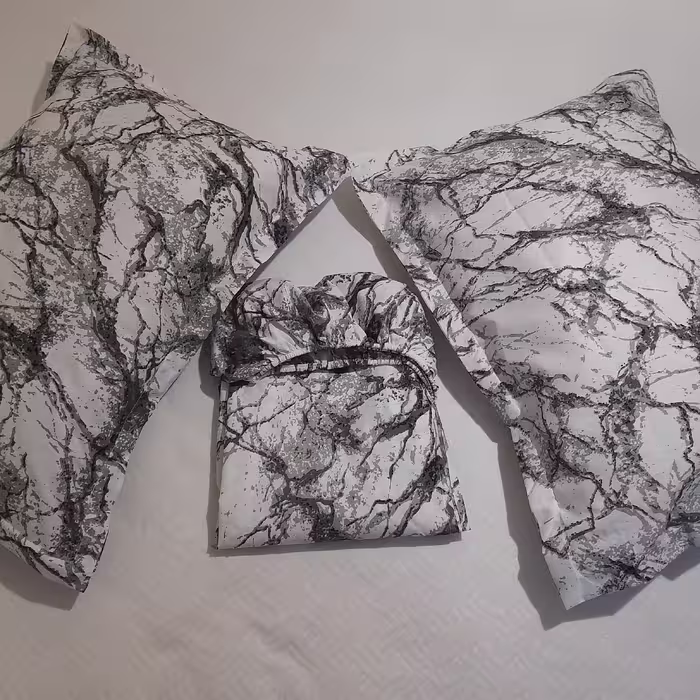 سرویس ملحفه مدل کشدار ni09087 طرح ماربل کد 140 دو نفره سه تکه