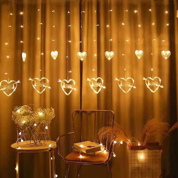 ریسه پرده ای12آویز قلب لاو رنگ آفتابی ریموت دار