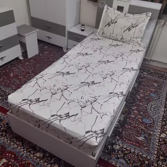 سرویس ملحفه مدل کشدوز niki08.25 طرح مرمر کد 100 یک نفره دو تکه