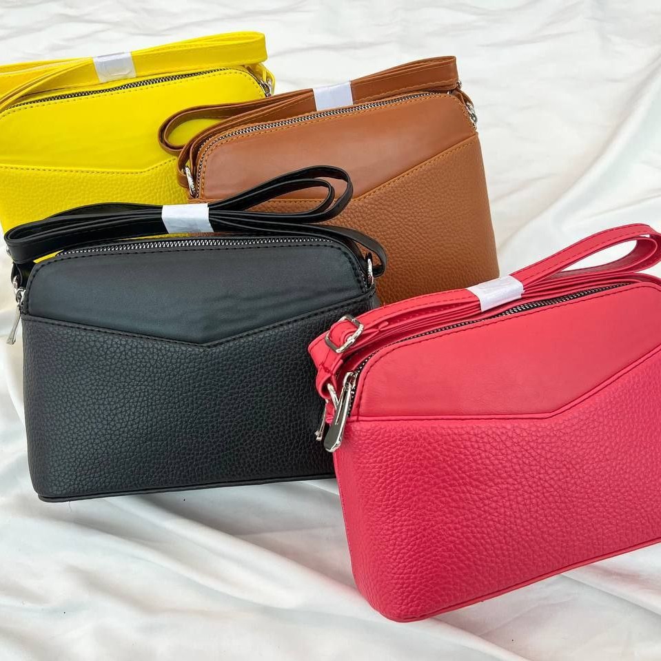 کیف کد 11667 
پاسپورتی شرانگ لبه ساده
ابعاد 23در15