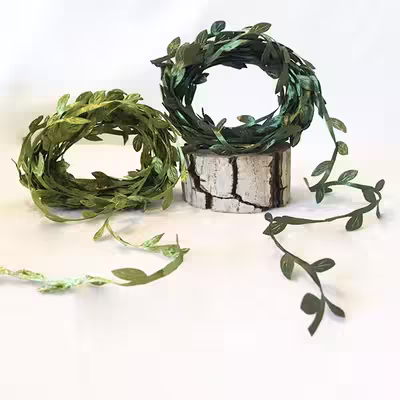گل مصنوعی مدل ریسه برگ پارچه ای کد 470 طول 9 متر