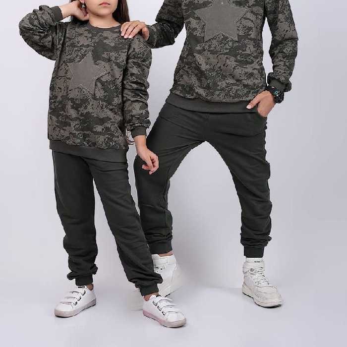 ست بلوز و شلوار اسپورت ارتشی تک ستاره شیک و جذاب کیفیت تضمینی جنس دورس دو نخ قواره آزاد مناسب حدود سنی 6 تا 14 سال