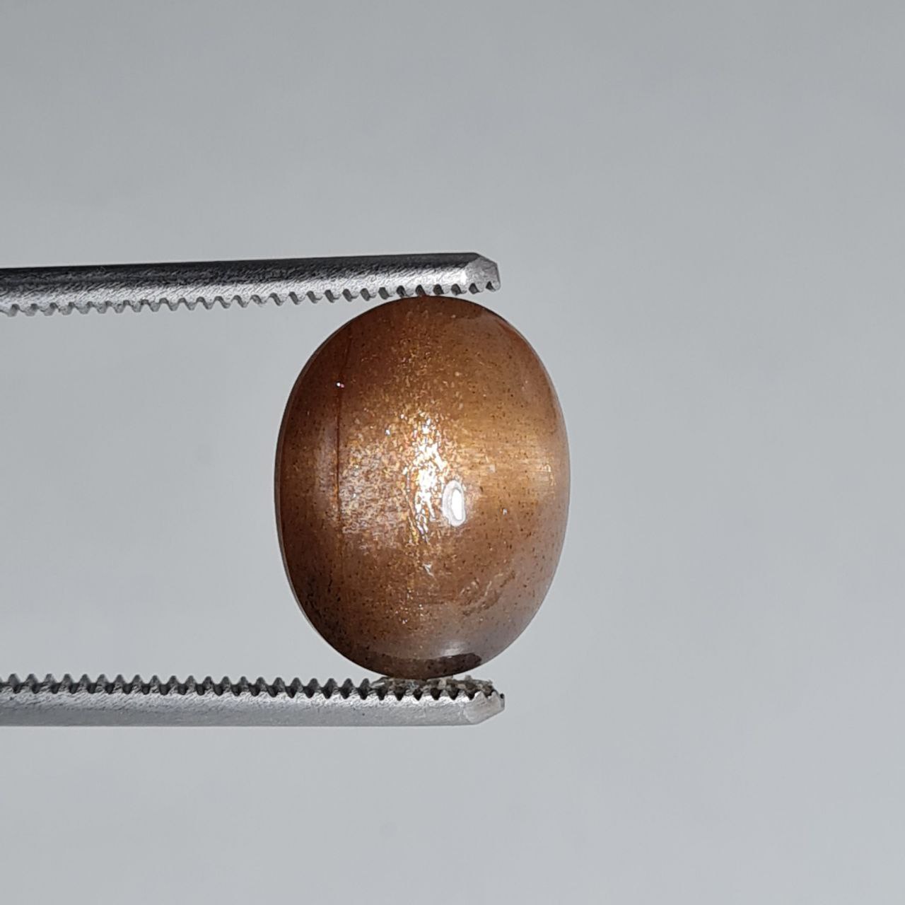 نگین سان استون طبیعی نارنجی بیضی 3586