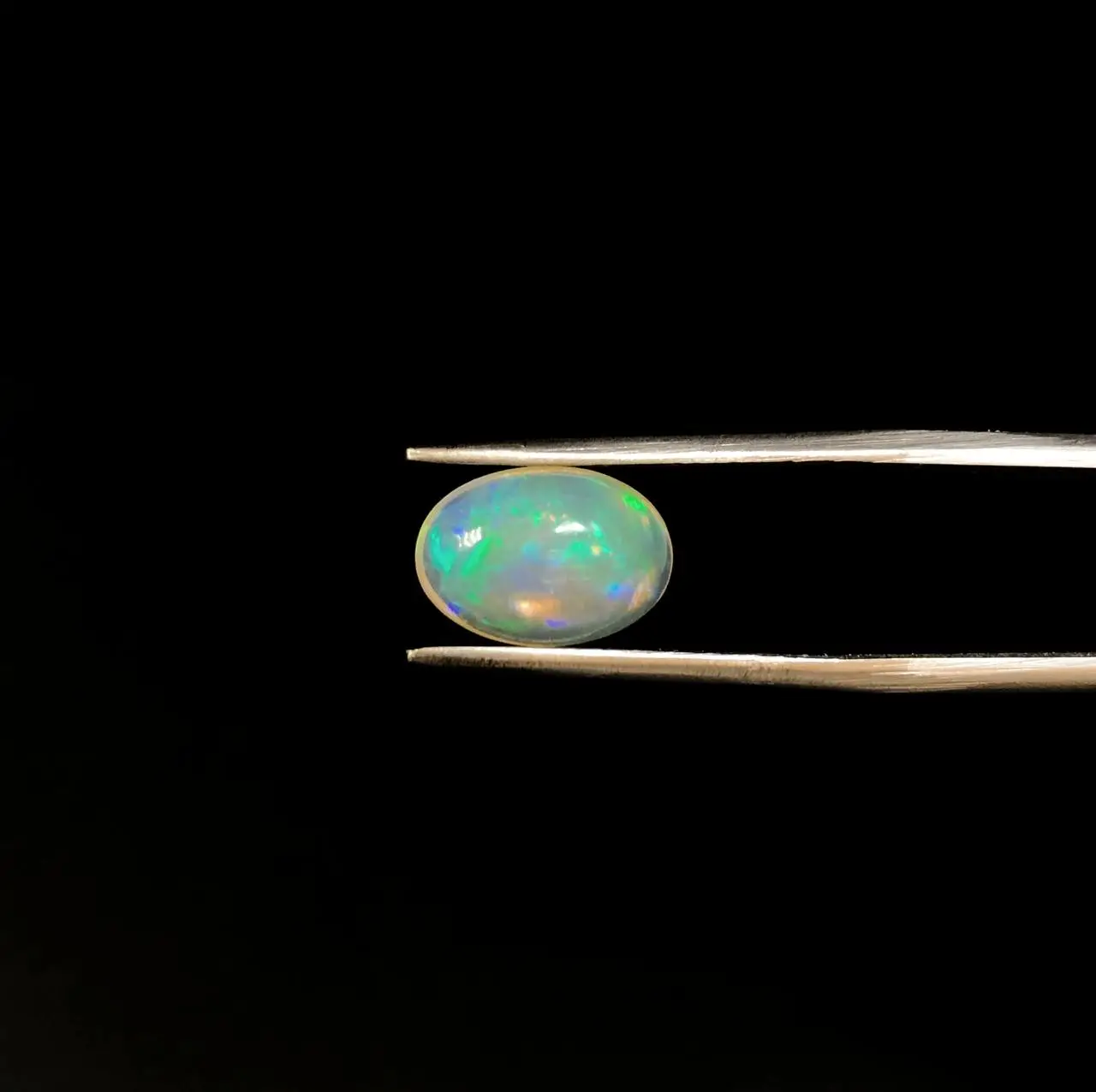 سنگ اوپال اصلی ژله ای سبزآبی 250127